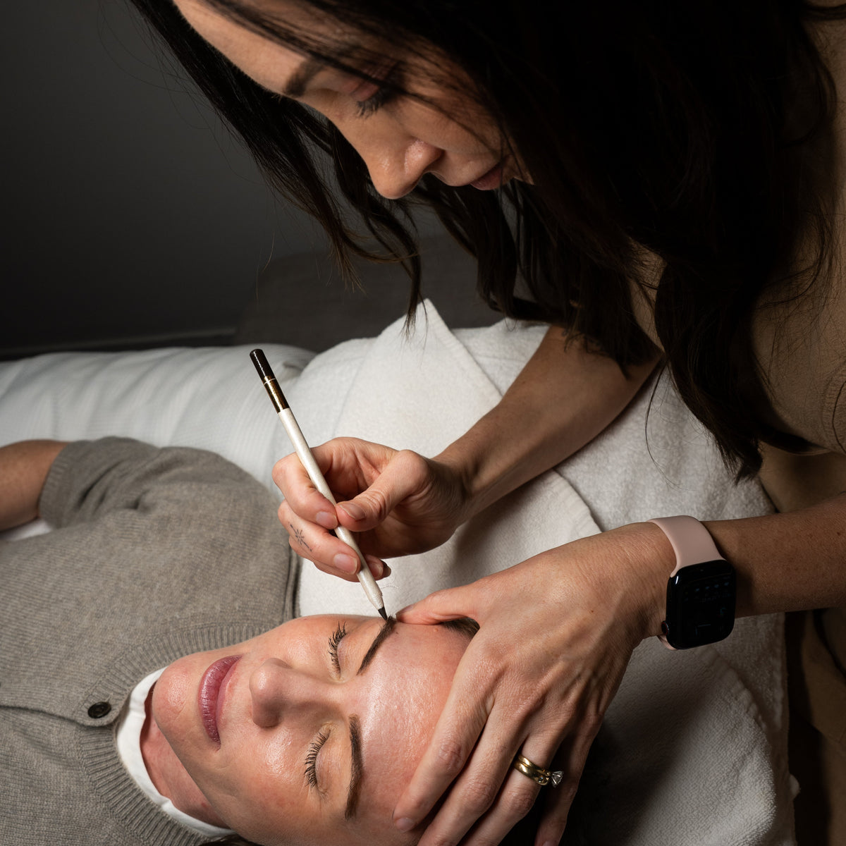 Brow sculpting with a brow pencil during a brow and lash treatment at Amavi Beauty Lounge, Brisbane