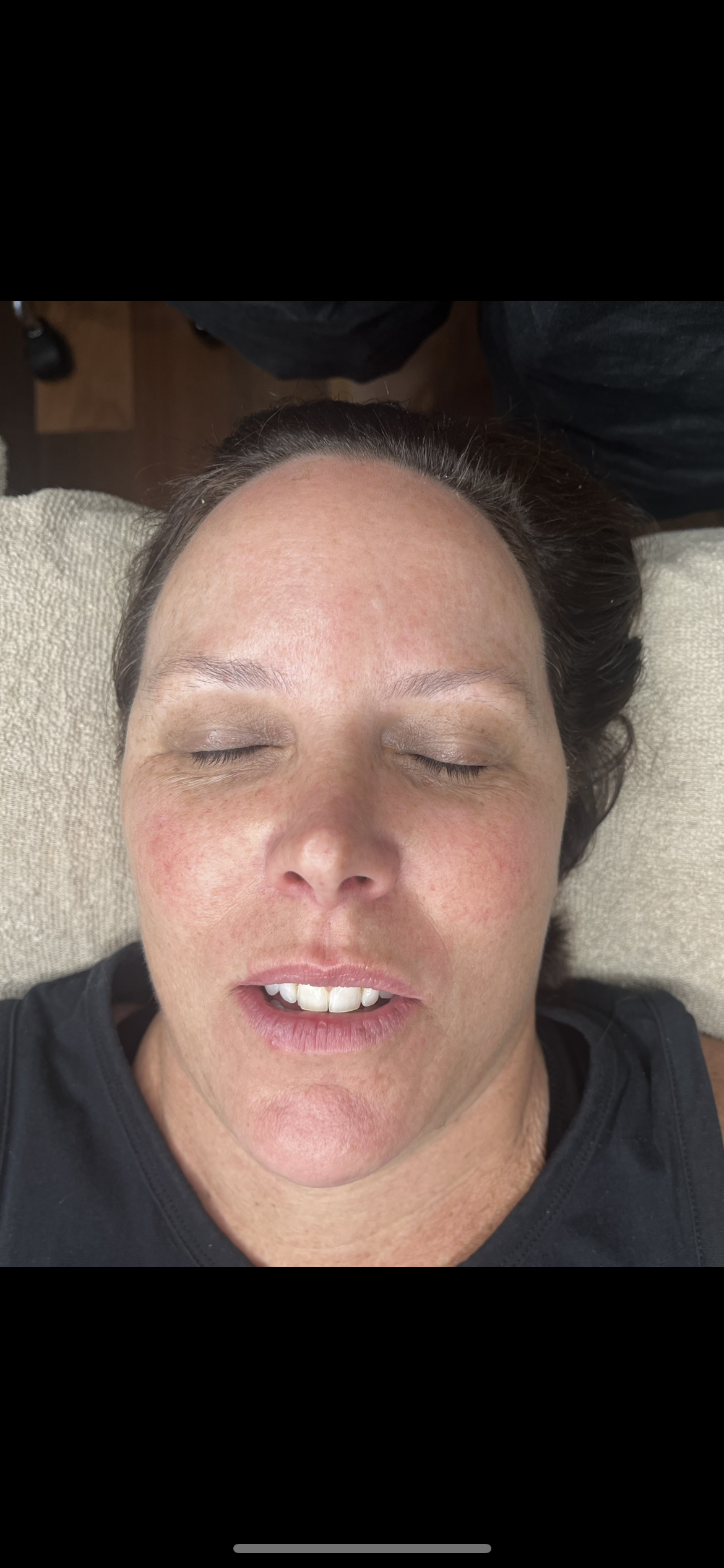 Client before microblading, with thin, faded eyebrows and no definition