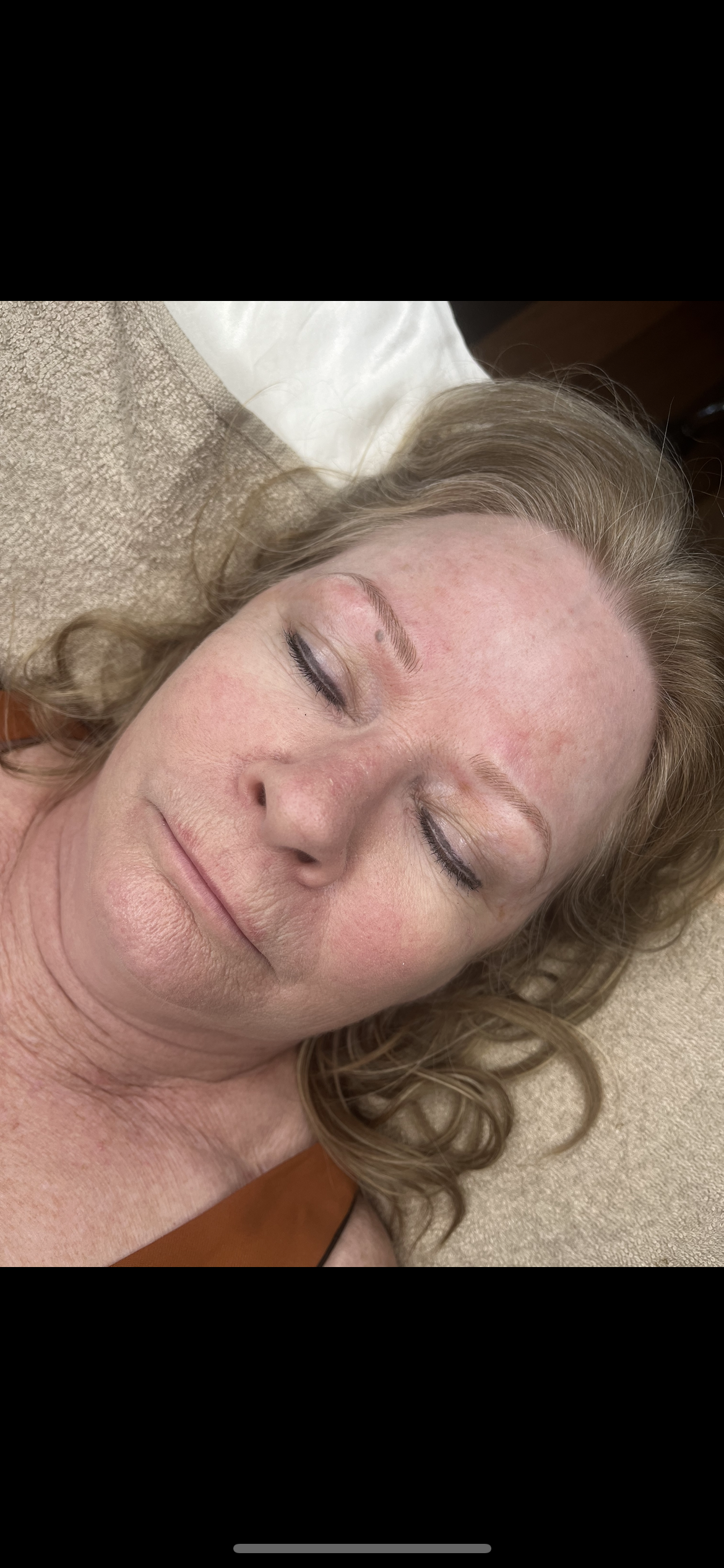 The same client after microblading at Amavi, with softly defined, fuller brows