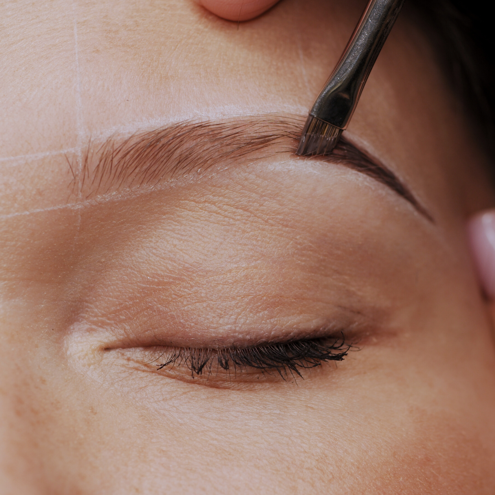 Close-up of eyebrow mapping and brow sculpting service at Amavi Beauty Lounge in Brisbane